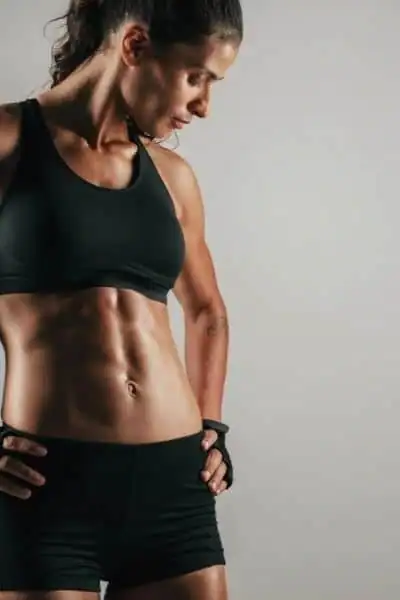 Toning Up at Home: The Ultimate Guide to Bodyweight Exercises 2 Image of woman's toned stomach after bodyweight exercises Surrey and non-surgical treatment from Lipo 360